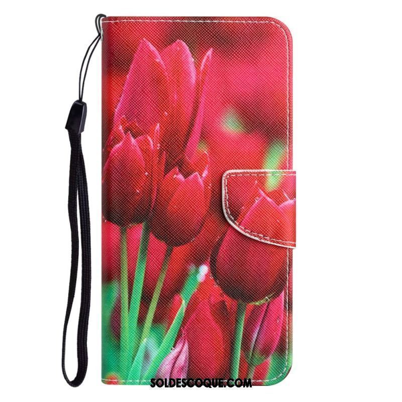 Housse iPhone 15 Déclinaison Florale à Lanière